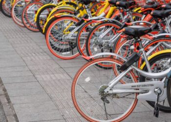 Shanghai: Rows of bikes are placed in the white lines painted on the road in Shanghai. The disorder of parking becomes a social problem according the increase of share bikes.