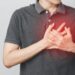 Man has chest pain suffering by heart disease, Cardiovascular disease, heart attack. Health care concept.